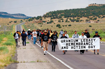 Marchers travel along New Mexico Highway 566 north of Churchrock Saturday morning in remembrance of a toxic spill in 1979. © 2011 Gallup Independent / Brian Leddy 